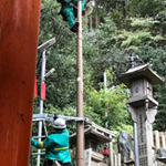 電線を直す関西電力の人